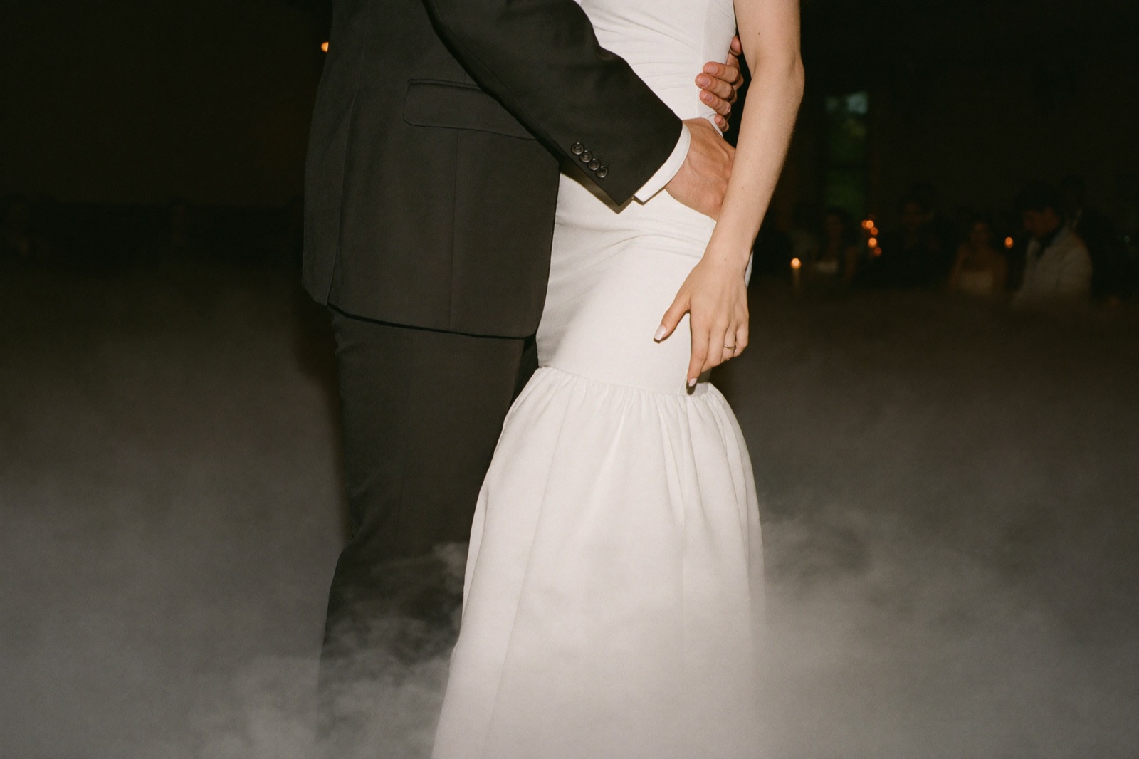 Couple's first dance surrounded by low-lying fog cloud effect