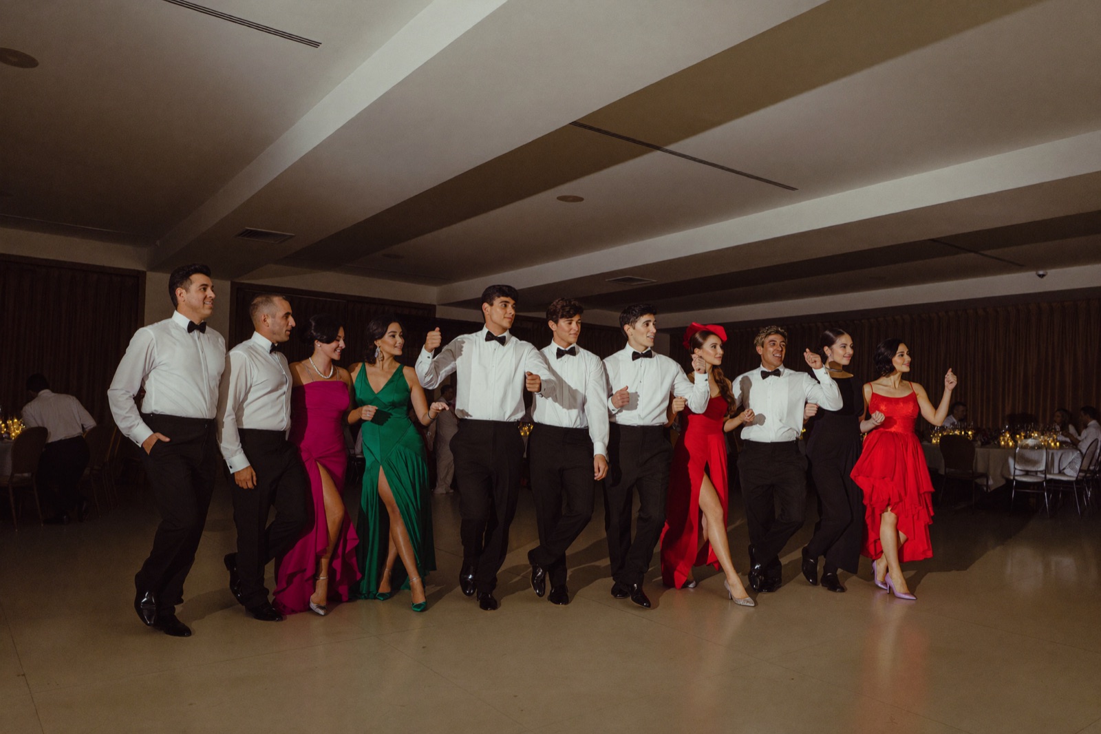 Elegant quinceañera celebration with colorful lighting and production